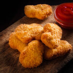 Nuggets on wood backgroundhttp://s019.radikal.ru/i638/1401/cf/956574f482c0.jpg