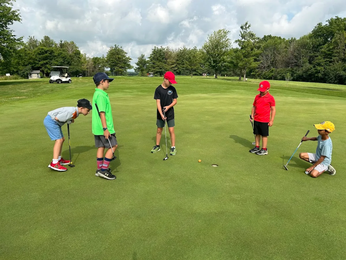 a group of young men playing a game of football